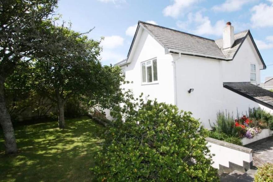 Clovelly Cottage, a detached family house in the village of Crantock, Near Newquay