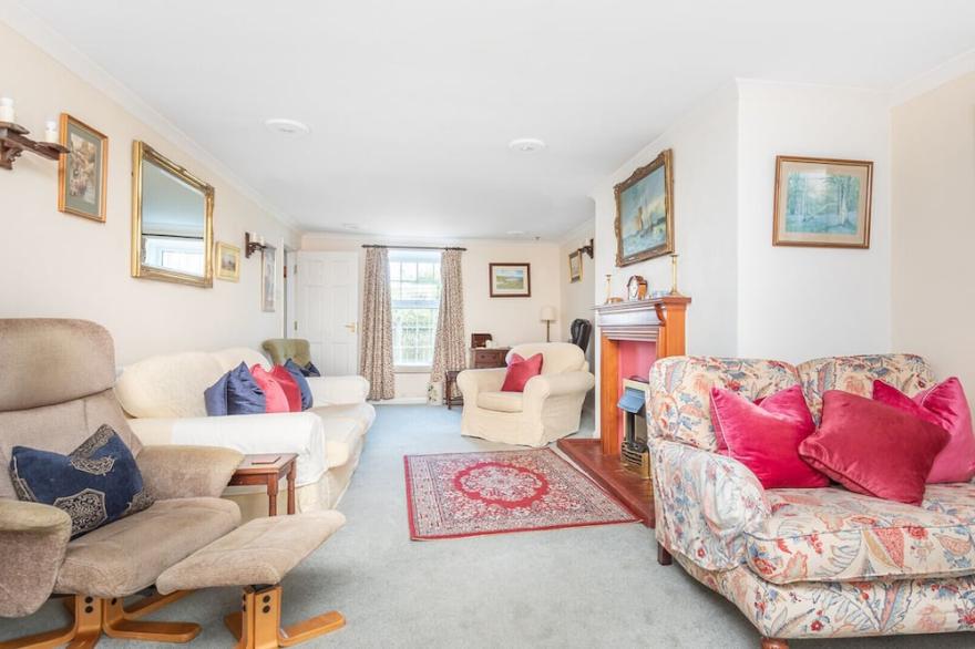 Clovelly Cottage, a detached family house in the village of Crantock, Near Newquay