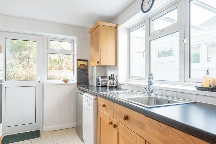 Clovelly Cottage, a detached family house in the village of Crantock, Near Newquay