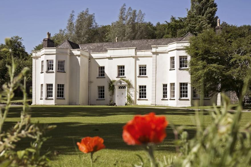 Tall John's House: A Large Georgian Manor House In Extensive Grounds
