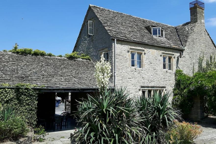 Beautiful Cotswolds Farm House With Period Features And A Stunning Garden.