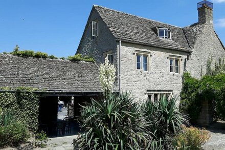 Beautiful Cotswolds Farm House with period features and a stunning garden.