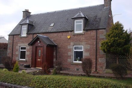 A century-old stone farmhouse with private garden and great views of Inverness