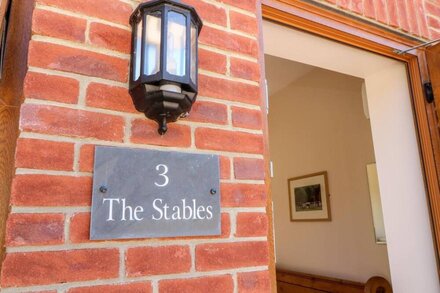 3 THE STABLES, with a garden in Ryde