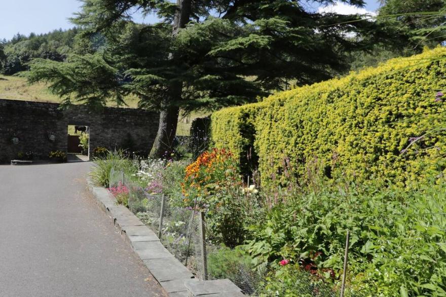 GRASMERE, with a garden in Greenodd