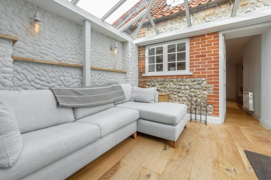 Barn Cottage provides stylish and spacious accommodation, with incredible views across the marshes t