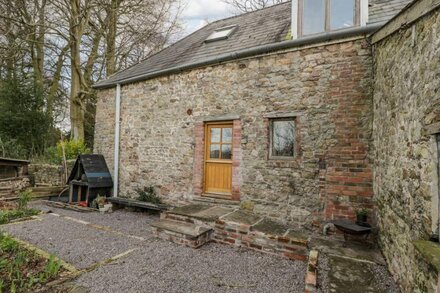 THE OLD STABLES, with a garden in Usk