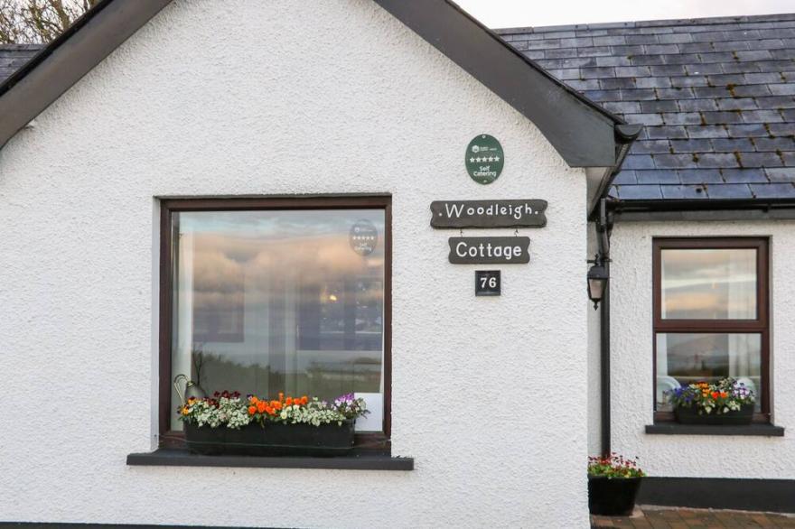 WOODLEIGH COTTAGE, with open fire in Ballycastle