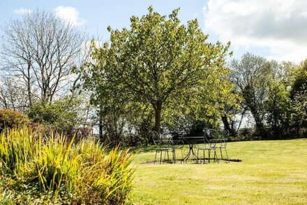 A beautiful traditional cottage, nestled in the countryside..