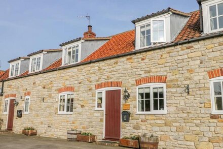 BARN COTTAGE, pet friendly, with open fire in Kirkbymoorside