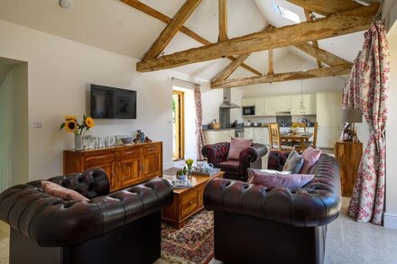 Luxury Barn conversion in village farm setting.