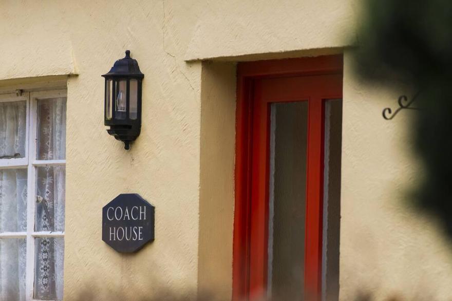 THE COACH HOUSE, Pet Friendly, Character Holiday Cottage In Pwllheli