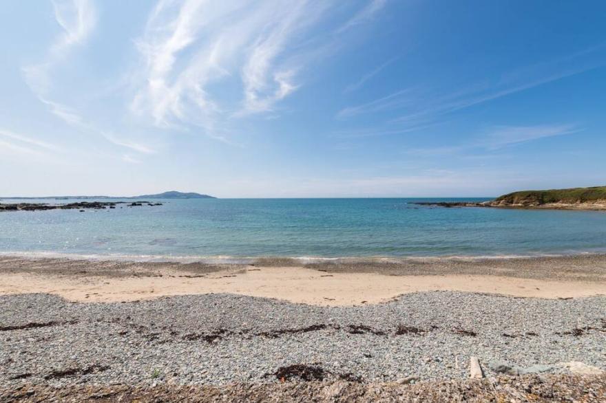 Swn Y Mor: Stunning Anglesey beachside holiday home, sleeps 10, sea views