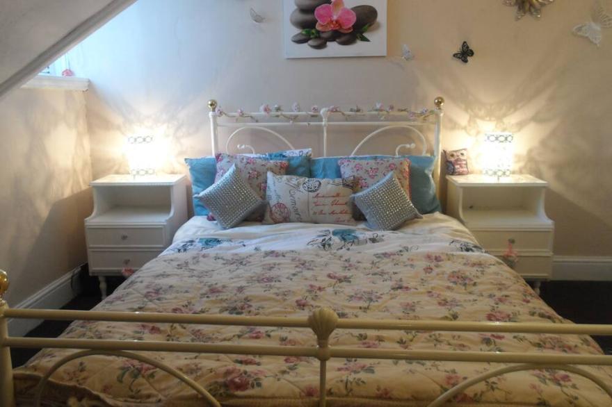 Trem Enlli is a homely 2 bed seafront apartment in Tywyn