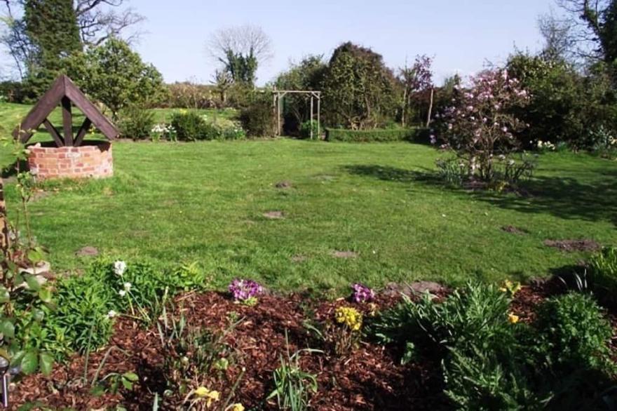 Garden Cottage is a Converted Barn Set in a Delightful South Facing Garden