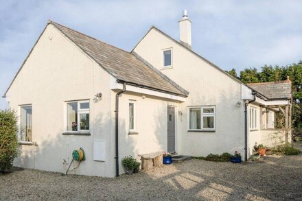 Charming characterful cottage overlooking Cornish countryside with sea view.