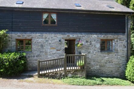 Stone Barn conversion on old traditional hill farm with wood-fired hot tub