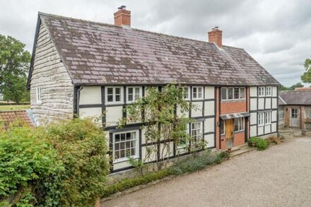 Two properties next door to each other with a games room, hot tub and bicycles