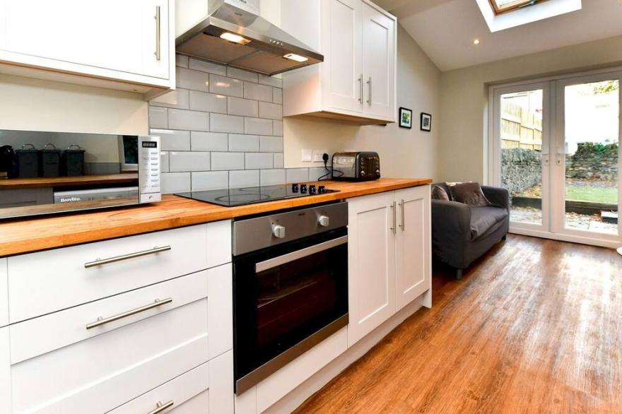 Pass the Keys | Cosy 2 bed house close to City centre with garden