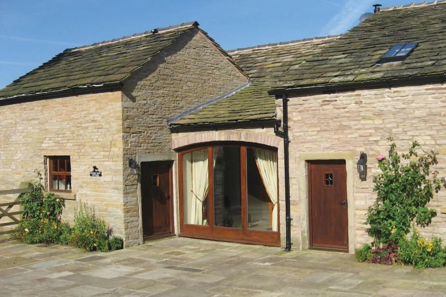 Orchard Cottage, On The Cheshire Border, Is An Intriguing Barn Conversion In The Peak District.