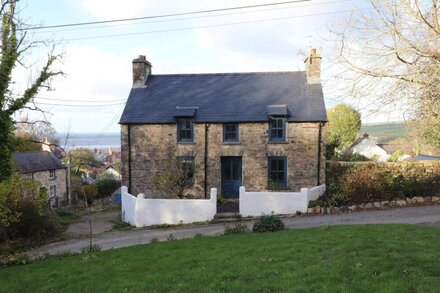 MILL COTTAGE, pet friendly, with a garden in Newport, Pembrokeshire