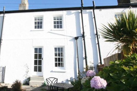 Lobster Pot in Portloe is one of the famous coastguard cottages overlooking this pretty village and out to sea