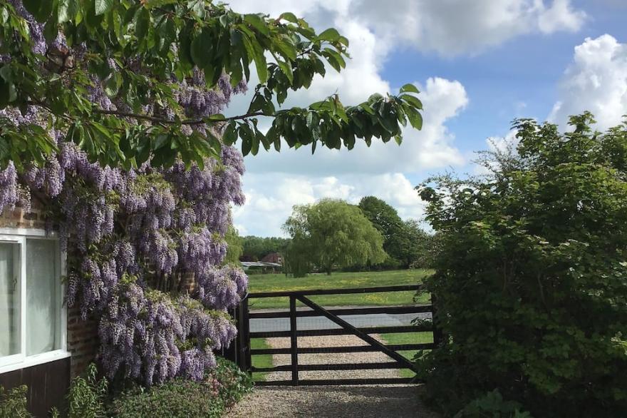 Stunning Barn Conversion With Lovely views of Traditional Village Green