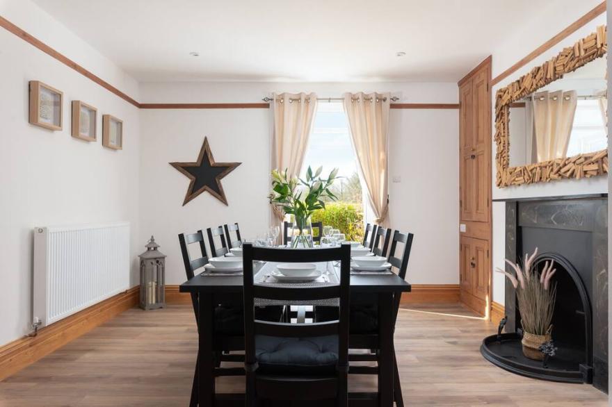Spacious 4-bedroom farmhouse in North Devon countryside with hot tub