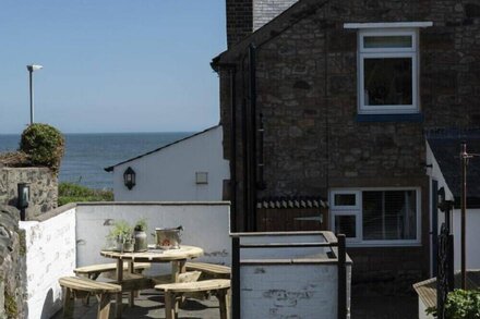 CREEL COTTAGE, CRASTER, pet friendly, with open fire in Craster