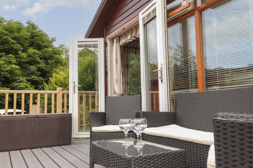 WOODLAND NOOK LODGE, pet friendly, with a garden in Windermere