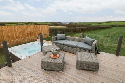 RAMSEY, character holiday cottage, with hot tub in Broad Haven