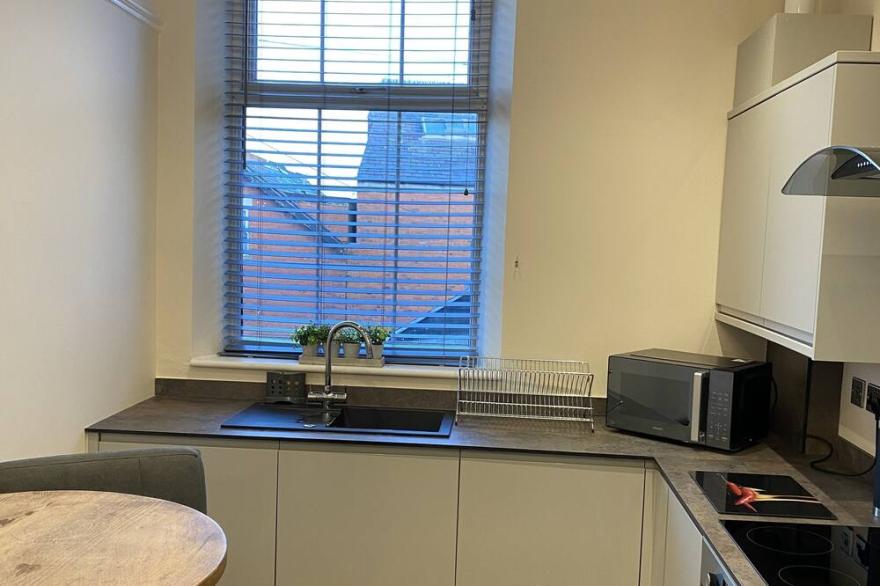 Boutique Apartment in great location with private parking