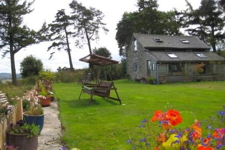 Cosy self catering cottage has everything you need with spectacular views.