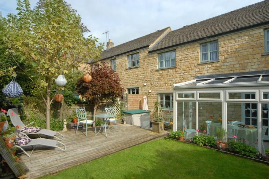 This Contemporary Cottage Enjoys A Peaceful Location In An Elevated Position.