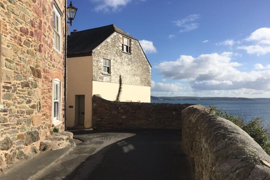 HOWTON COTTAGE - village cottage on coast path next to beaches