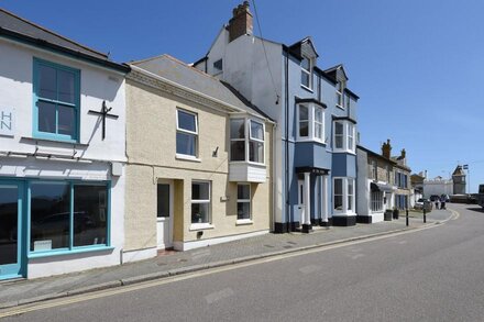 Stunning Beautiful Beamed Cottage right opposite the Beach along with Sea Views