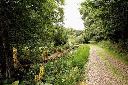 Four and a half miles south of Helston, this delightful cottage is situated on a tranquil estate.