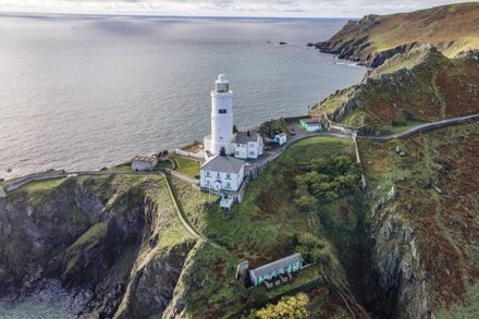 This detached cottage for six guests is perched on the cliff edge it enjoys views across Start Bay.