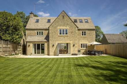 Set back from the road at the end of a private gated gravel driveway, this lovingly restored, spacio