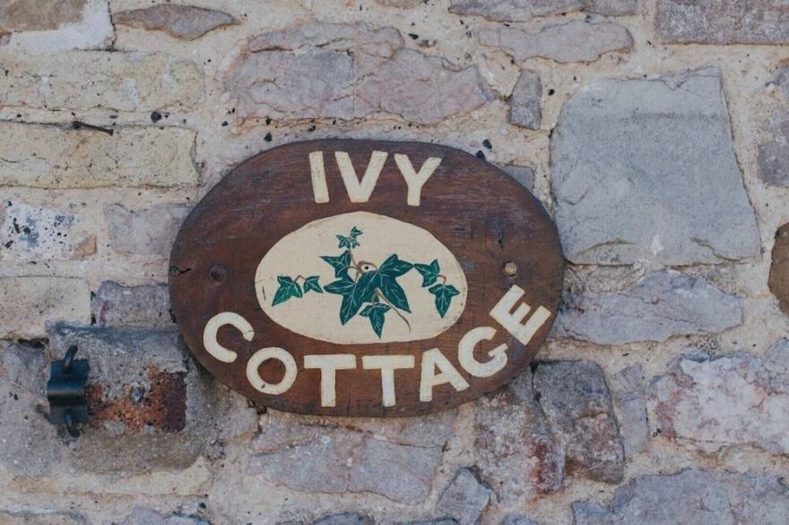 Swallow Cottage at Tytanglwyst Farm  with private hot tub and wood burning fire
