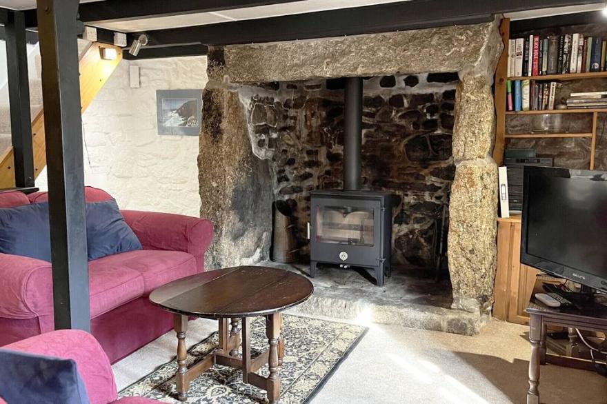 Poldhu Cottage is a Cornish granite cottage full of charm located in St Buryan near the Minack Theatre