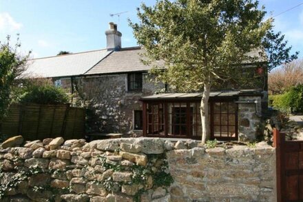 Poldhu Cottage is a Cornish granite cottage full of charm located in St Buryan near the Minack Theatre