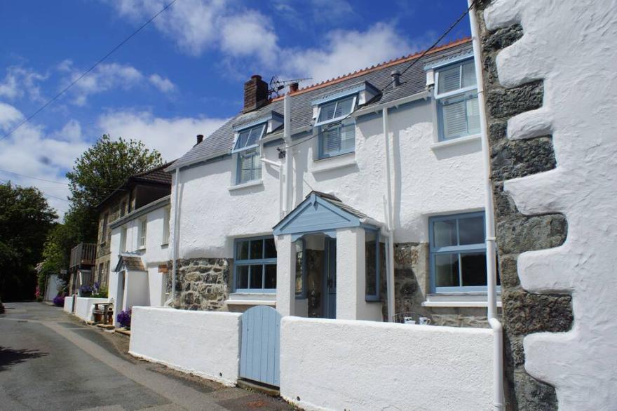Fisherman’s cottage 100 yards from the sea with log burner and own parking