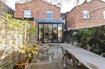 Interior designed house with garden in North West London by UnderTheDoormat