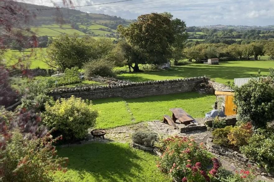 Old Coach House with stunning views over the Brecon Beacons. Sleeps 9 + cot