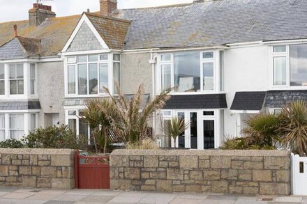 Seaspray, a mid terrace cottage situated in the attractive seaside town of Penzance