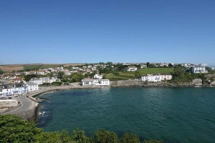 Longships is an older bungalow offering superb sea views and cliffside garden