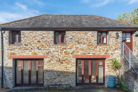 Hay Barn is a spacious stone barn conversion located on a working farm with beautiful countryside views