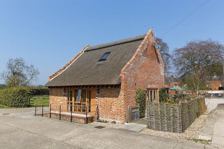 Sitting amongst farmland, this barn offers a peaceful luxury rural retreat.