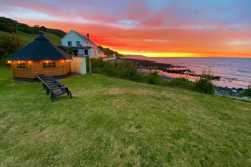 Beachfront property with stunning views, hot tub & Nordic BBQ hut - Antrim Coast